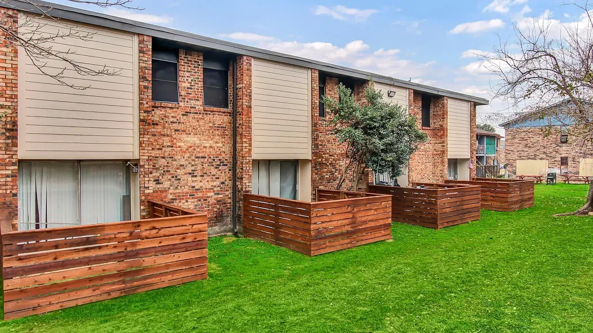 Woods of Haltom Townhomes — Photo 1