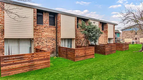 Woods of Haltom Townhomes Photo 1