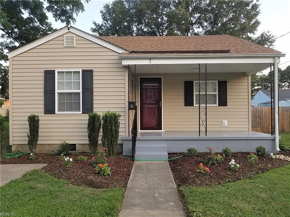Large freshly painted front porch sets the tone as you enter this beautifully remodeled home.