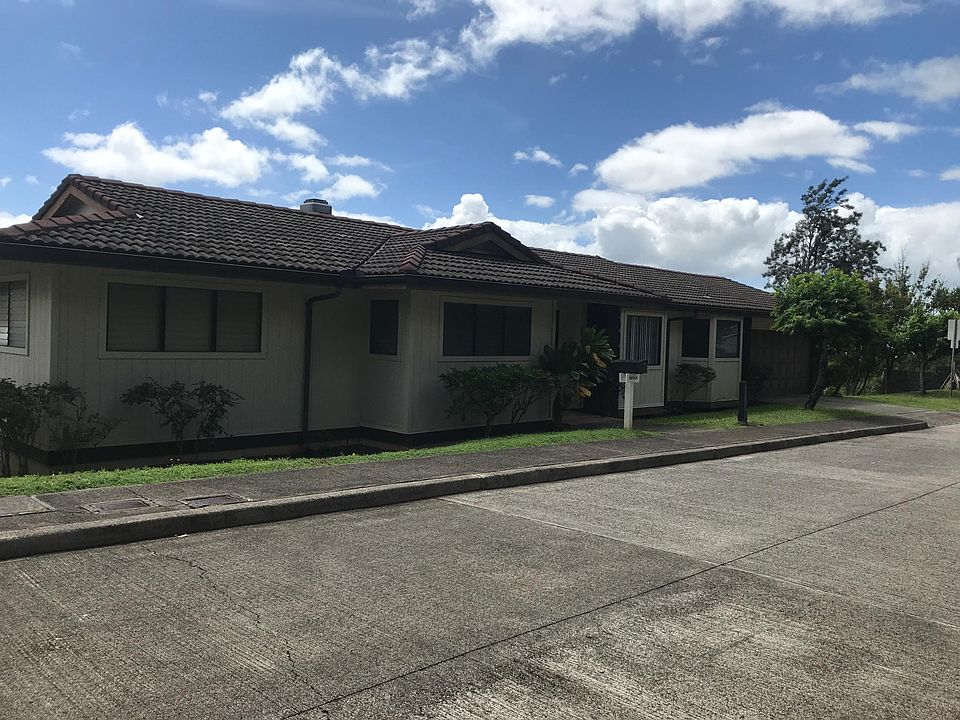 Front entrance of home with enclosed garage