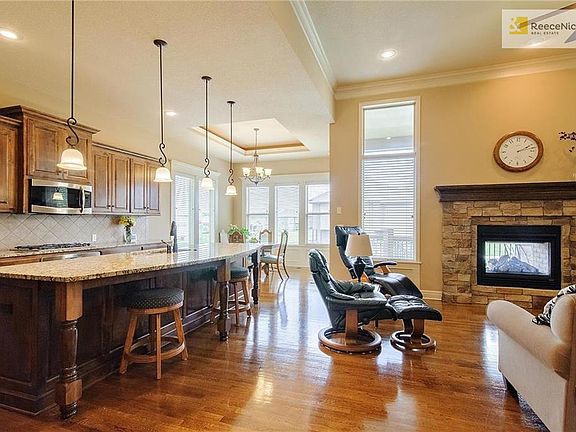 Open floor plan makes for easy entertaining.  The expansive granite island provides abundant space whether you're cooking, entertaining or doing homework!
