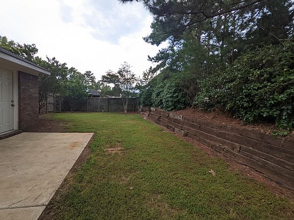 Small fenced backyard.