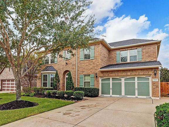 There is an extension along the side of the driveway to enable you to park a 3rd car. Home is located on a cul de sac street.