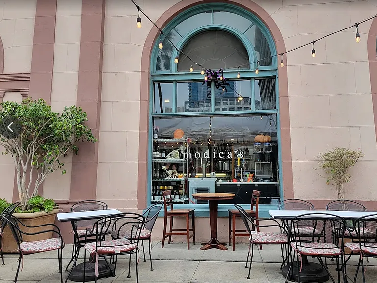 Modica's cafe located in the building on ground level.