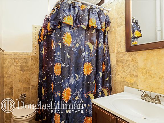 5th image of 409 Edgecombe Ave APT 1E