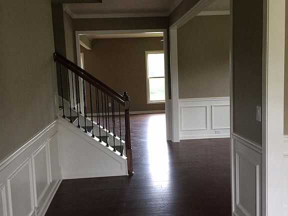 Hardwoods throughout main floor, wide welcoming entrance