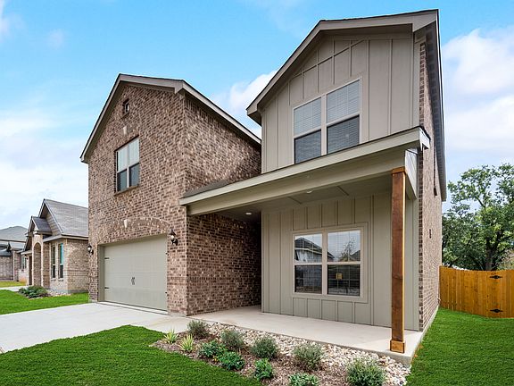 This home has incredible curb appeal with a charming front porch.
