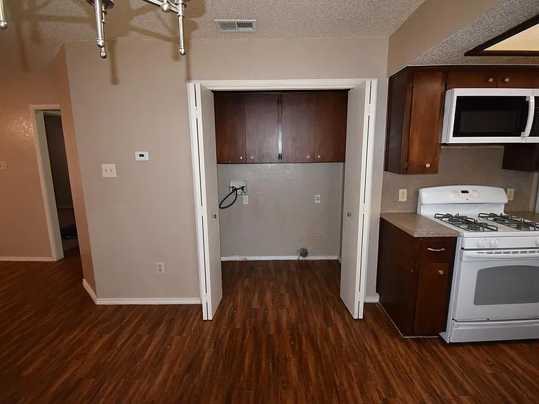Laundry closet with washer and dryer connections