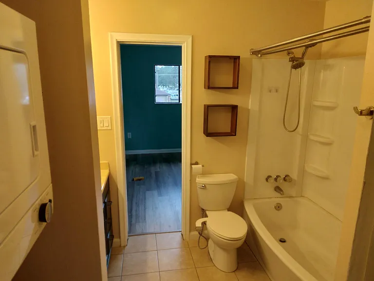 upstairs full bath with tub and bidet