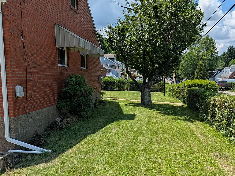 side of house into the back yard, along Sunset