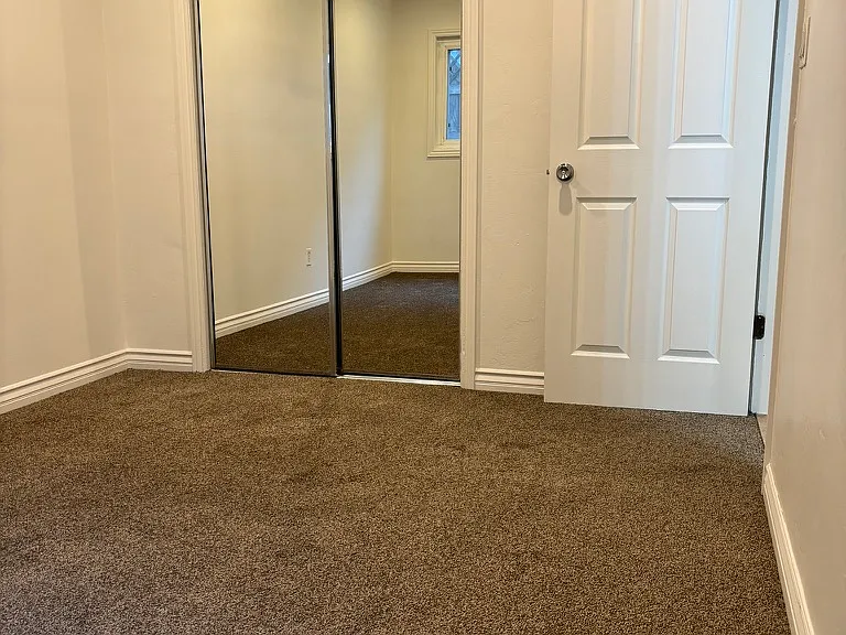 BackSmaller Bedroom