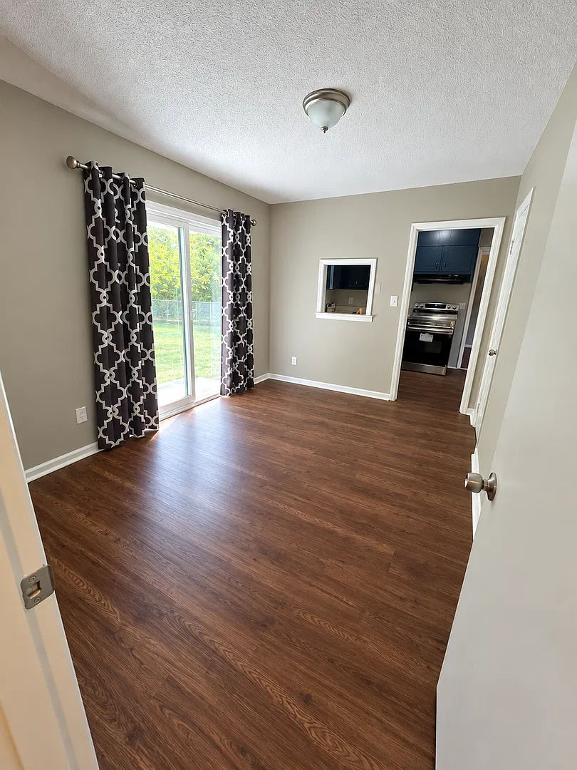 Charming 3BR Home with Fresh Updates & Fenced Backyard — Photo 4