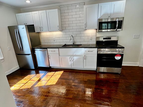 The kitchen has all brand new appliances with lots of cabinet space.