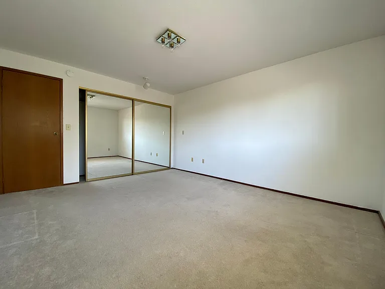 Huge primary bedroom enjoys awesome territorial views and ample closet space!