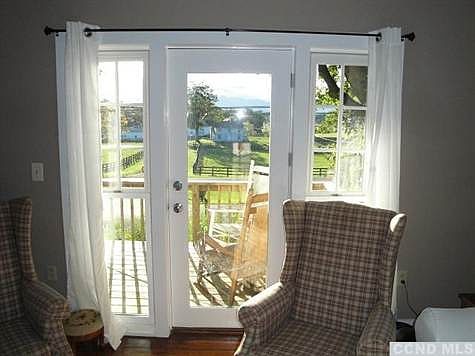 Wall of glass in LR facing view.