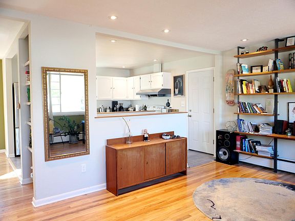 living room with shelving units
