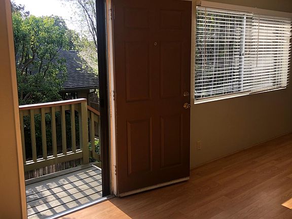 Front Door entry overlooking lush landscaping