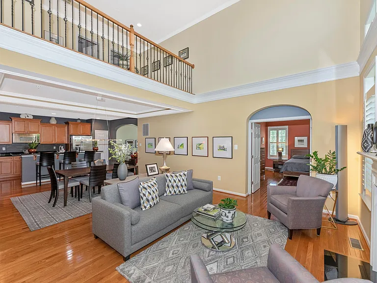 The 2 gray arm chairs are no longer at this property