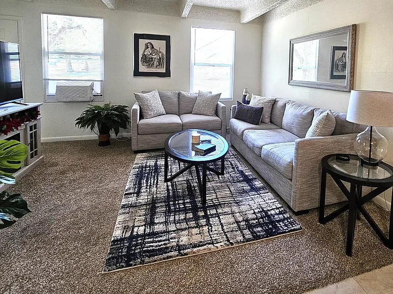 Living Room shown with Furniture. Furniture not included.