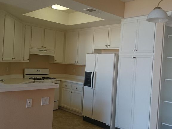 Spacious open kitchen with lots of storage (refrigerator is 