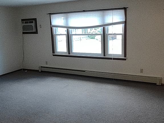 Picture window and through wall A/C unit in LR