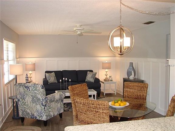Your Beach retreat! Freshly painted, new flooring and charming wainscoting..