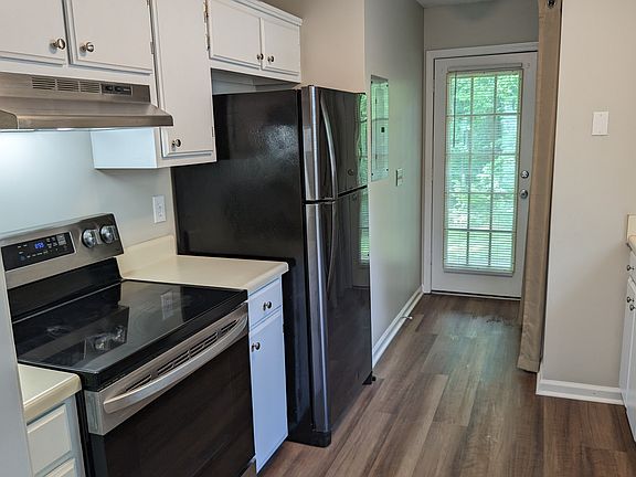 Kitchen with New Refridgerator 
and Stove.
Washer and Dryer provided.