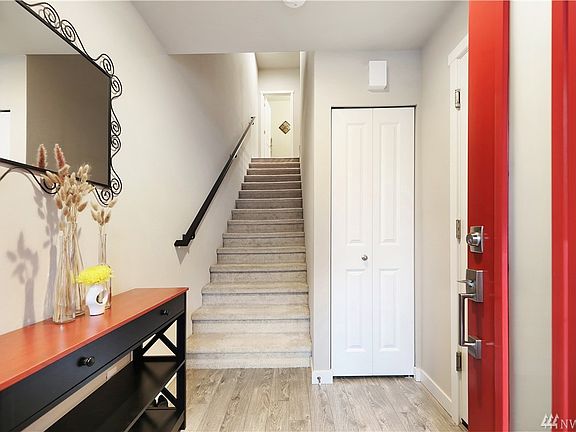 Spacious entryway complete with coat closet. 