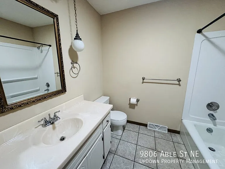 9806 Able St NE — Photo 27