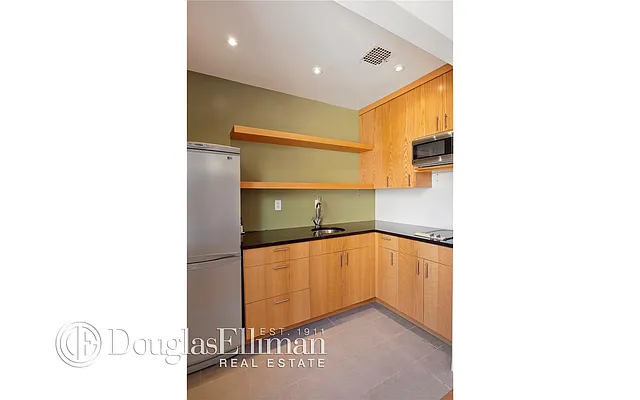 Sold by Douglas Elliman | media 11