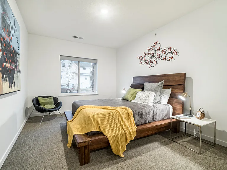 Enjoy a private and peaceful bedroom to recharge after a long day.