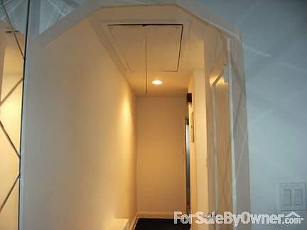 Hallway with pulldown attic