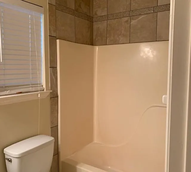 Bathroom located at the end of the hallway