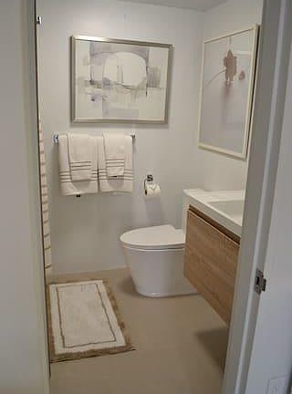 bathroom with shower and washer/dryer