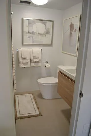 bathroom with shower and washer/dryer