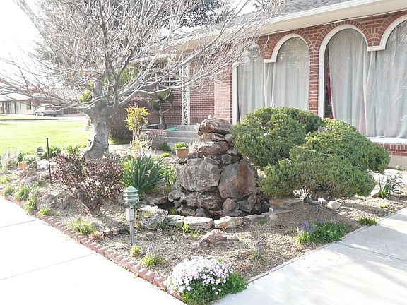 Lillian side fountain and large picture windows