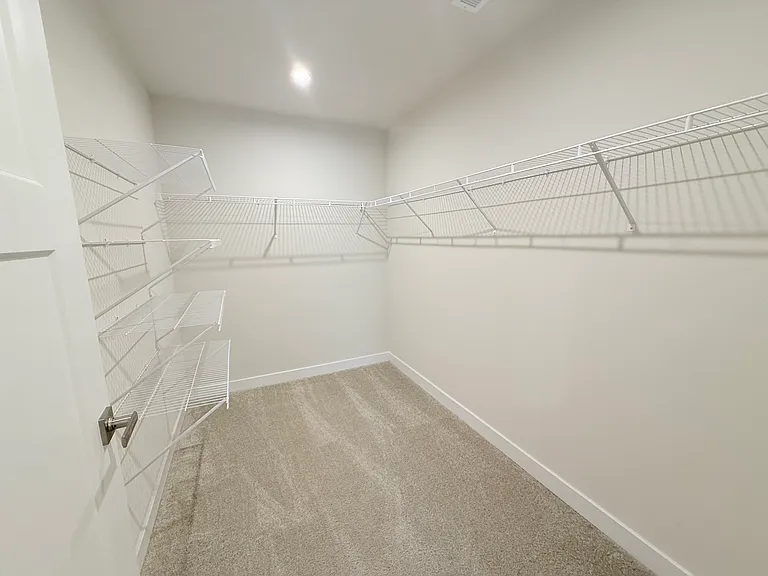 Primary closet with lots of space
