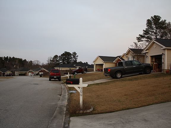 street view, facing pond