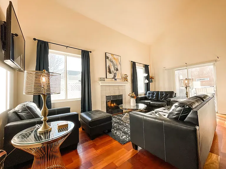 Living Room with Fireplace with walk out deck