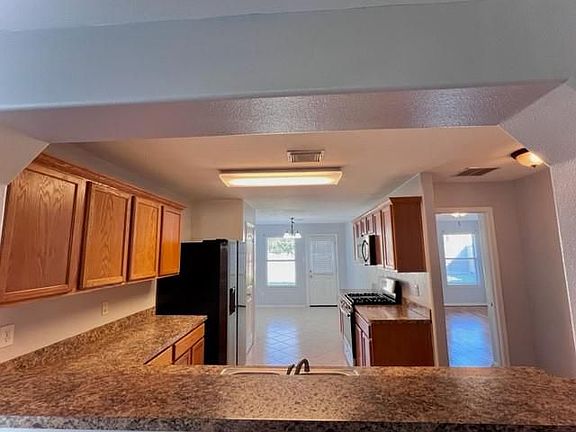 5th image of 7710 American Holly Ct