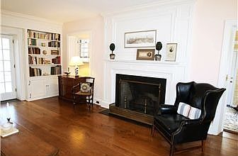 2nd view of Living Room with woodburning fireplace