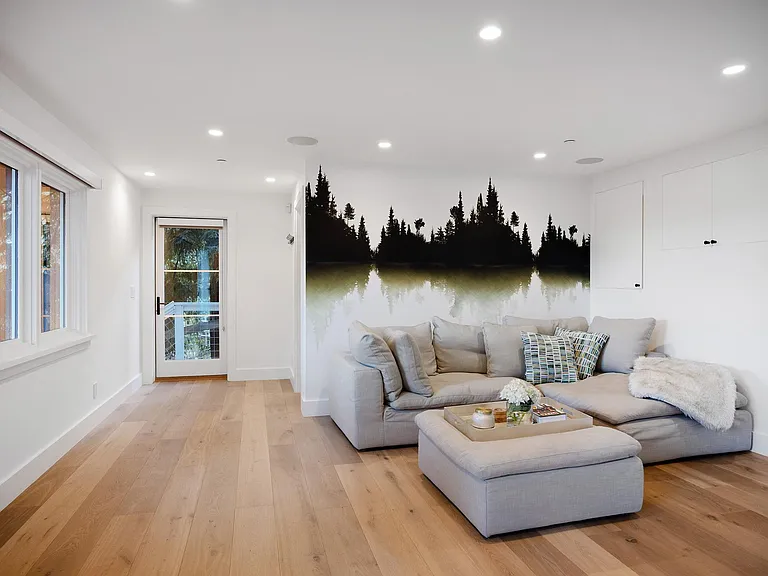 Third floor, media room or in-law unit. Separate entrance, motorized black-out shades, & kitchenette. Separate deck.