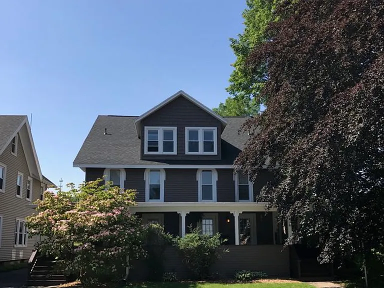 Front of the house as seen from Pleasant St. Both bushes have been pulled for a better view.
