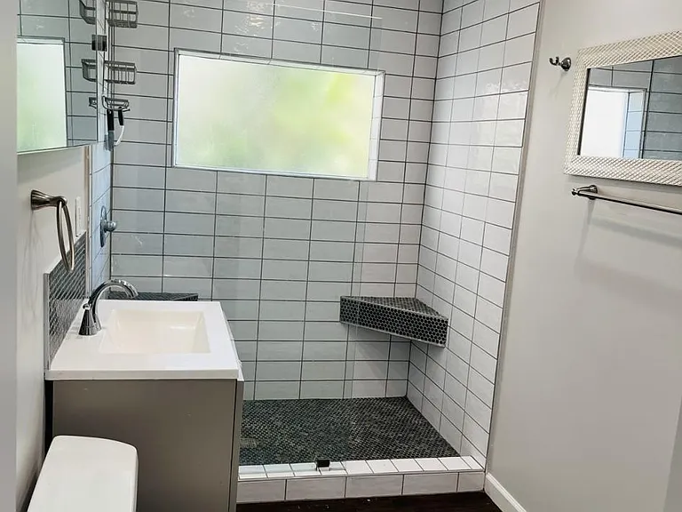 Bathroom, viewing from the barn-door/kitchen location.