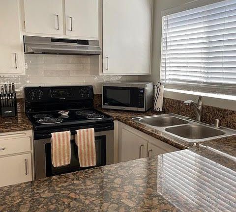 Fully stocked kitchen.