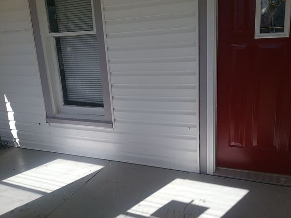 Large enclosed front porch