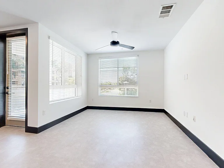 Apartment Living Room with Tile Floor and Patio/Balcony.