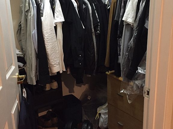 Large walk-in closet in bedroom