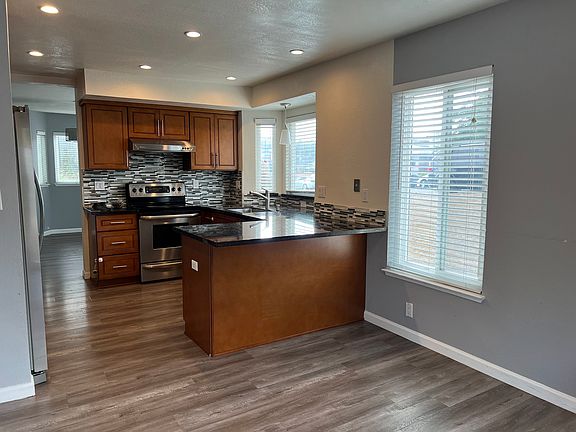 Kitchen with attached dining area and pantry