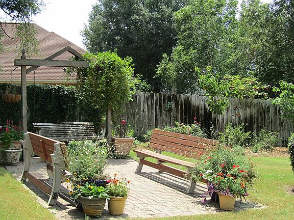 Paved area in front of swing